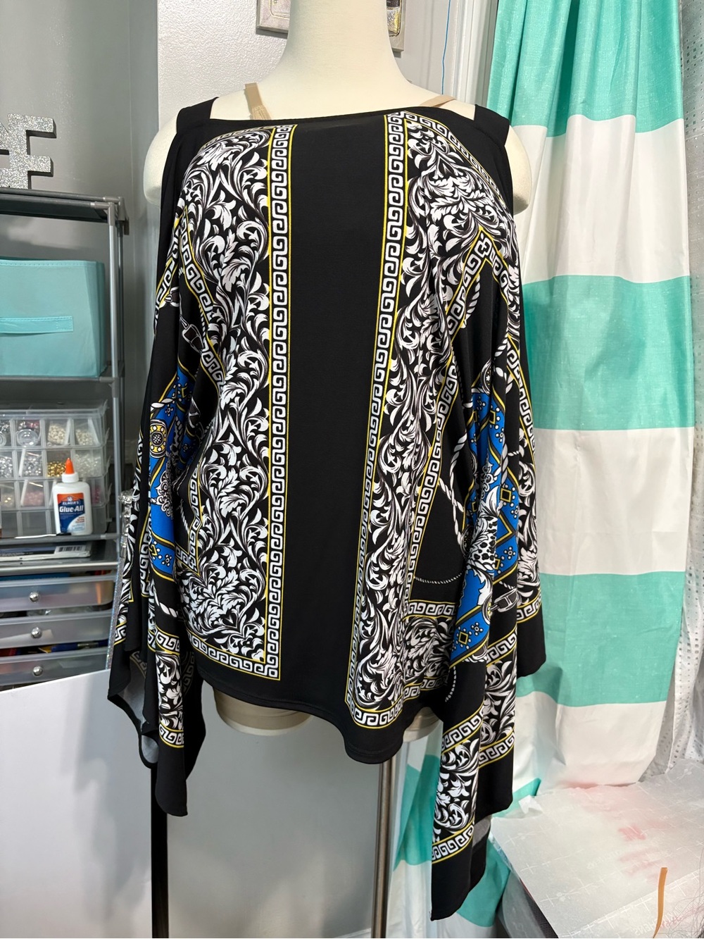 Ashley Stewart Black Cold-Shoulder blouse with Blue, White & Gold Pattern